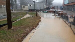 Sediment loss from a construction site during a rain storm.